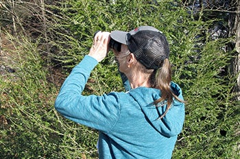 Woman with binoculars