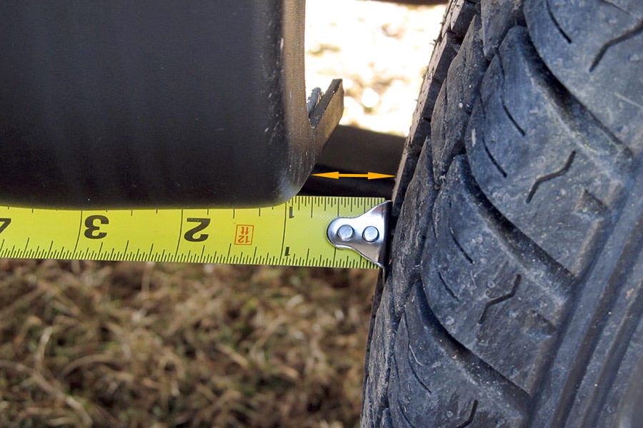 Tape measure showing tire clearance distance