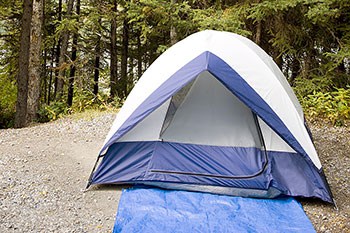 Blue tent on gravel