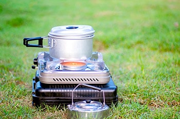 Camp stove with cooking pot