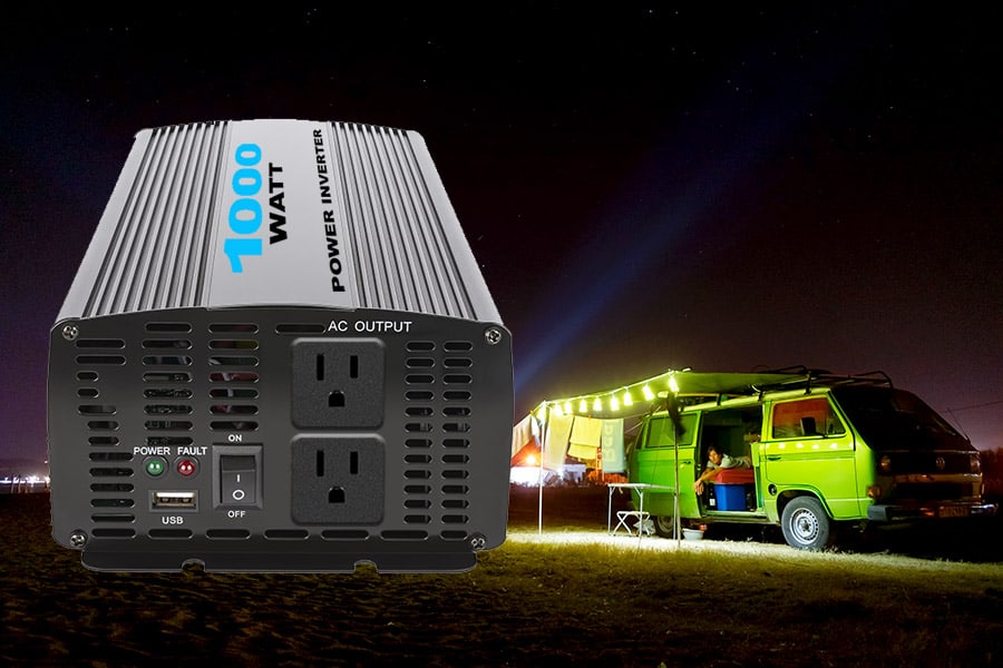 Power inverter with a green camper van in the background