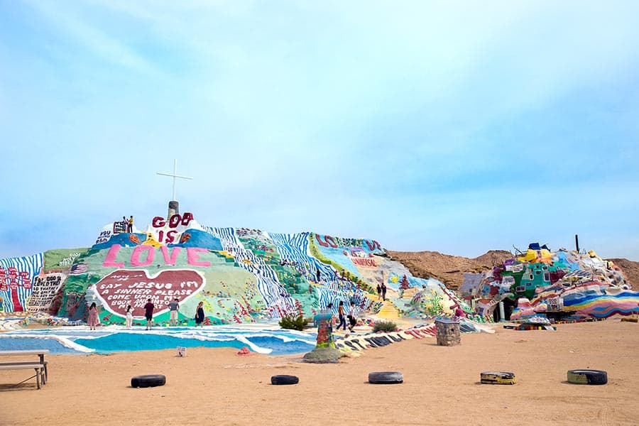 Colorful paintings and people at Slab City, California