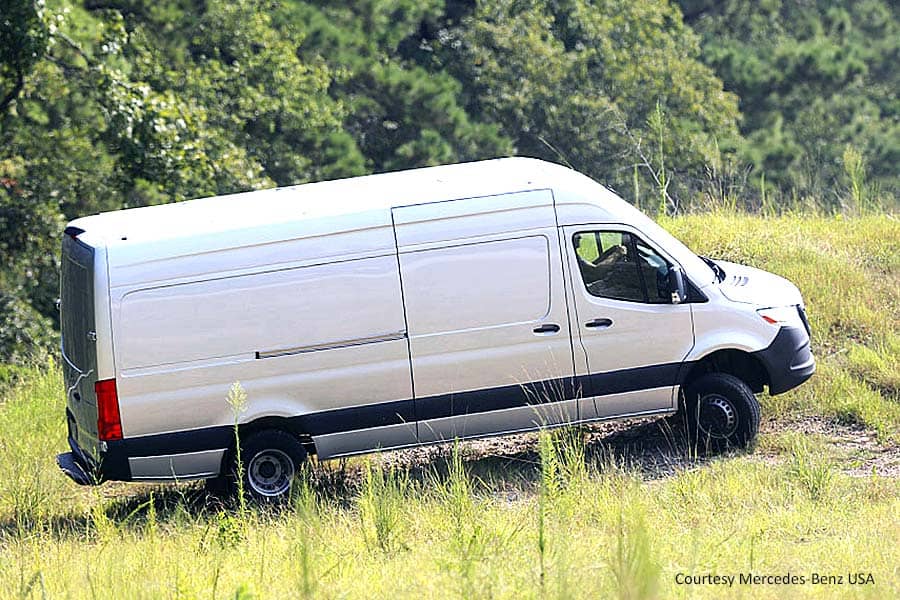 White Mercedes van in a rural location